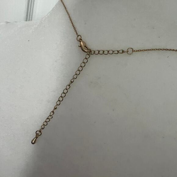 Long M Initial Necklace on a Gold Tone Chain - Picture 4 of 5